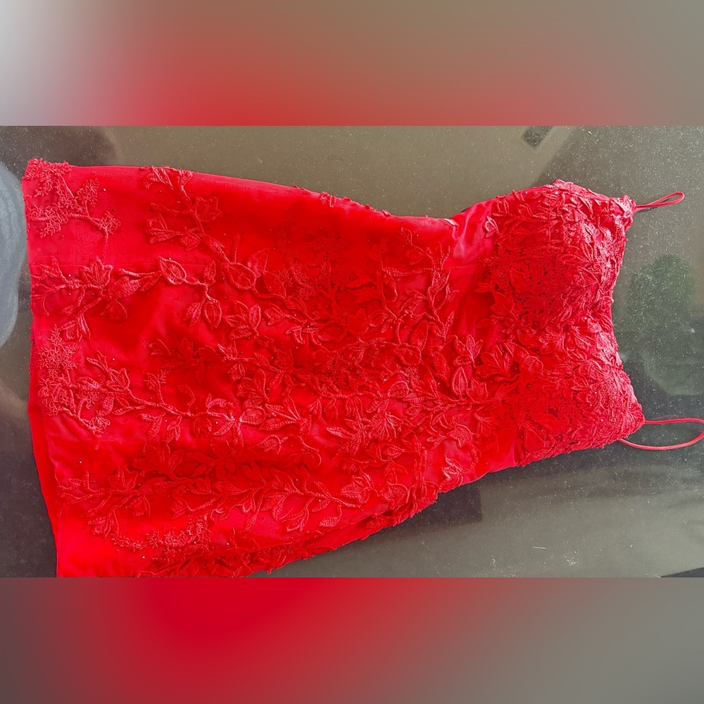 Red mini Sherri hill dress with lace up back number 53151. Size 6